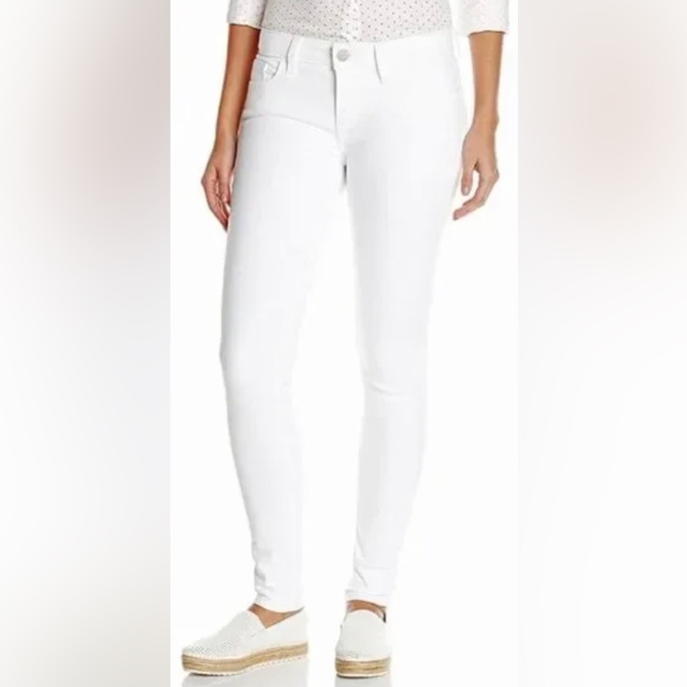 Levi’s white skinny jeans with studded pockets